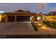 Two-story home with landscaped yard, three-car garage, and attractive exterior at 3182 N 159Th Dr, Goodyear, AZ 85395