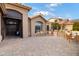 Inviting front patio with seating area and brick paving at 3182 N 159Th Dr, Goodyear, AZ 85395