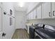 Laundry room with washer, dryer, and ample counter space at 3182 N 159Th Dr, Goodyear, AZ 85395