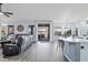 Open living space with kitchen and view of backyard at 3182 N 159Th Dr, Goodyear, AZ 85395