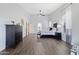 Main bedroom with king-size bed and plenty of natural light at 3182 N 159Th Dr, Goodyear, AZ 85395