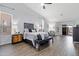 Spacious main bedroom with a king-size bed and access to a patio at 3182 N 159Th Dr, Goodyear, AZ 85395
