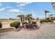 Relaxing patio area with water feature and golf course view at 3182 N 159Th Dr, Goodyear, AZ 85395