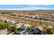 Aerial view of a residential area featuring a house with a pool at 3632 E Cotton Ct, Gilbert, AZ 85234