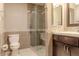 Bathroom with shower, toilet and dark brown vanity at 4135 N 17Th St # 11, Phoenix, AZ 85016