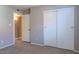 Bedroom with carpet flooring and double door closet at 4135 N 17Th St # 11, Phoenix, AZ 85016