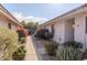 Building exterior showcasing a walkway, landscaping, and building number 11 at 4135 N 17Th St # 11, Phoenix, AZ 85016