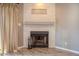 Corner fireplace with a stone surround at 4135 N 17Th St # 11, Phoenix, AZ 85016