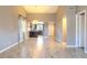 Spacious living room with wood-look floors and kitchen view at 4135 N 17Th St # 11, Phoenix, AZ 85016