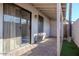 Covered patio with sliding glass door access and artificial turf at 4135 N 17Th St # 11, Phoenix, AZ 85016