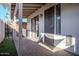 Private patio with covered area, tile flooring, and artificial turf at 4135 N 17Th St # 11, Phoenix, AZ 85016