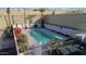 Refreshing community pool with patio furniture at 4135 N 17Th St # 11, Phoenix, AZ 85016