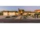 Contemporary home with desert landscaping and a three-car garage at 4414 E Vermont S Ave, Phoenix, AZ 85018