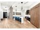 Well-lit kitchen with a large island, modern lighting, and hardwood floors at 4414 E Vermont S Ave, Phoenix, AZ 85018
