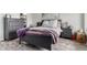 Cozy bedroom with gray furniture and wood-look floors at 4455 E Paradise Village S Pkwy # 1031, Phoenix, AZ 85032