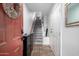 Bright entryway with tiled floors, staircase, and access to other rooms at 4455 E Paradise Village S Pkwy # 1031, Phoenix, AZ 85032
