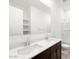 Modern bathroom with double sinks, a large mirror, and ample counter space at 4828 N 177Th Ln, Goodyear, AZ 85395