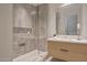 Modern bathroom with a glass-enclosed shower and sleek vanity with quartz countertop at 5000 N Camelback Ridge Rd # 109, Scottsdale, AZ 85251