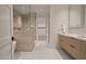 Beautiful bathroom featuring tiled walk-in shower with glass door and a vanity sink with two drawers at 5000 N Camelback Ridge Rd # 109, Scottsdale, AZ 85251