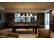 Well-lit game room with a pool table, comfortable lounge area, and ample space for entertainment at 5000 N Camelback Ridge Rd # 109, Scottsdale, AZ 85251