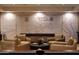 Relaxing game room with decorative map wall, seating, and table games at 5000 N Camelback Ridge Rd # 109, Scottsdale, AZ 85251