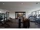 Bright gym space equipped with modern Matrix workout machines and mirrored wall at 5000 N Camelback Ridge Rd # 109, Scottsdale, AZ 85251