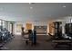 Well-lit gym area featuring treadmills, weight machines, and a neutral color palette at 5000 N Camelback Ridge Rd # 109, Scottsdale, AZ 85251