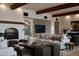 Comfortable living room featuring a cozy fireplace and stylish decor at 5000 N Camelback Ridge Rd # 109, Scottsdale, AZ 85251
