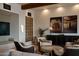 Warm and inviting living room with comfortable seating and stylish decor at 5000 N Camelback Ridge Rd # 109, Scottsdale, AZ 85251