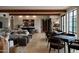 Spacious living room with open floor plan, multiple seating areas, and modern design at 5000 N Camelback Ridge Rd # 109, Scottsdale, AZ 85251