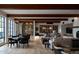 Well-lit lounge area with wood-beamed ceiling and comfortable seating at 5000 N Camelback Ridge Rd # 109, Scottsdale, AZ 85251