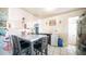 Kitchen features a dining table and view into living room at 501 E Kinderman Dr, Avondale, AZ 85323