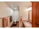Bathroom featuring a granite countertop, wooden floors, and a toilet in a small space at 5306 N 20Th St, Phoenix, AZ 85016