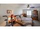 Bright bedroom featuring a bed, bedside tables with lamps, and a bookshelf at 5306 N 20Th St, Phoenix, AZ 85016