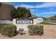 A welcoming entrance sign for the La Jolla community with lush landscaping and 