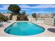 Community pool with plenty of lounge chairs and seating, adjacent to clubhouse and landscaping at 5306 N 20Th St, Phoenix, AZ 85016