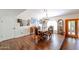 A dining room featuring a large table and chairs, tile floors, and a buffet table at 5306 N 20Th St, Phoenix, AZ 85016