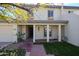 Inviting two-story home featuring a covered porch, two-car garage, and well-maintained landscaping at 5306 N 20Th St, Phoenix, AZ 85016