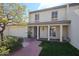 Charming two-story home with attached garage, manicured lawn, and covered porch at 5306 N 20Th St, Phoenix, AZ 85016