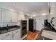 Updated kitchen featuring stainless steel appliances, granite counters, and sleek cabinets at 5306 N 20Th St, Phoenix, AZ 85016