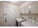 Laundry room featuring new side-by-side washer and dryer at 5306 N 20Th St, Phoenix, AZ 85016