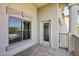 The balcony has a window and a glass door to the apartment at 5450 E Deer Valley Dr # 4015, Phoenix, AZ 85054