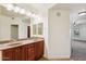 Bathroom with shower, double sink, and vanity with granite countertop at 5450 E Deer Valley Dr # 4015, Phoenix, AZ 85054