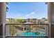 Balcony view of resort-style pool and well maintained landscaping at 5450 E Deer Valley Dr # 4015, Phoenix, AZ 85054