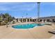 Community pool and spa with lounge chairs at 5933 E Main St # 47, Mesa, AZ 85206