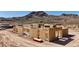 Construction of home is underway with mountain backdrop; dirt lot at 6126 E Maverick Rd, Paradise Valley, AZ 85253