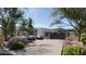 Spacious driveway with gates and beautiful landscaping at 6126 E Maverick Rd, Paradise Valley, AZ 85253