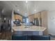 Modern kitchen with island, stainless steel appliances, and granite countertops at 650 N Hawes Rd # 2709, Mesa, AZ 85207