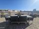 Outdoor dining set on patio with view of backyard at 650 N Hawes Rd # 2709, Mesa, AZ 85207