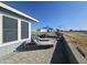 Patio with lounge chairs and outdoor umbrella at 650 N Hawes Rd # 2709, Mesa, AZ 85207